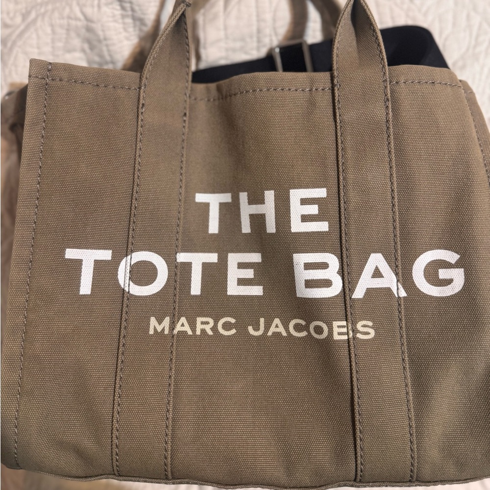 Marc Jacobs army green medium canvas Tote Bag. Comes with black body strap.